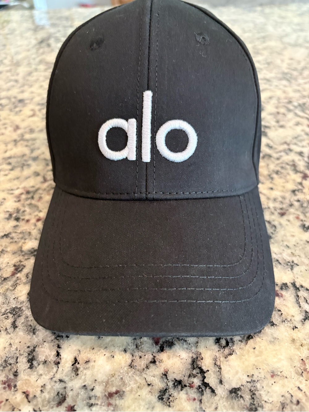 ALO Yoga Black Cap with White Embroidered Logo